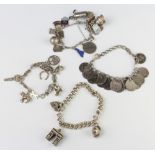 Four silver charm bracelets, 116 grams