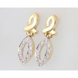A pair of 18ct yellow gold paste set earrings