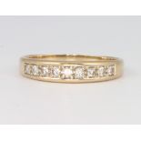 A 9ct yellow gold diamond ring size P, 2 grams