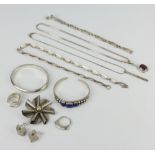 A silver bracelet and minor silver jewellery 137 grams