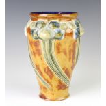 A Doulton Lambeth Art Nouveau vase decorated with stylised flowers 25cm