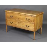 A 19th/20th Century Continental light oak chest of 2 long drawers with brass swan neck drop handles,