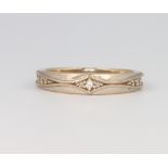 An 18ct white gold diamond ring size M, 3.2 grams