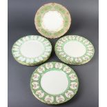 Eleven Royal Doulton dinner plates with green and gilt borders together with a similar ditto Most