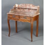 A 19th Century French walnut wash stand, the with pink veined marble top with 3/4 gallery, the