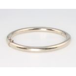 A 9ct white gold bangle 8.6 grams