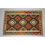 A brown, white and green ground Maimana Kilim 127cm x 83cm