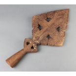 A pierced and carved hardwood staff head 34cm x 16cm