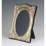 A repousse silver photograph frame 20cm