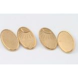 A pair of 9ct yellow gold engine turned cufflinks 5.9 grams