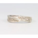 A 9ct white gold diamond twist ring, size P, 3.6 grams