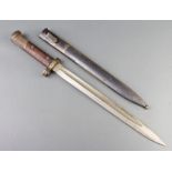A "Swedish" Mauser bayonet with 30cm blade complete with scabbard marked ES with rampant lion 46