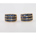 A pair of 18ct yellow gold sapphire half hoop earrings, 11.4 grams