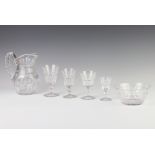 A suite of cut glass table glassware comprising 9 liqueur glasses, 13 sherry glasses, 13 small