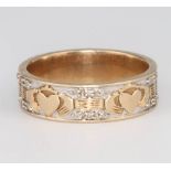 A 9ct yellow gold diamond Claddagh ring, size O 1/2, 4.6 grams