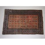 A blue and tan ground Caucasian rug, having a central medallion and geometric design within multi