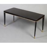 A rectangular Art Deco style ebonised coffee table with gilt metal trim 56cm x 120cm w x 51cm d