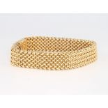 A 9ct yellow gold mesh link bracelet, 20cm, 27.3 grams