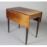 A 19th Century mahogany Pembroke table fitted a drawer raised on square tapered supports 70cm h x