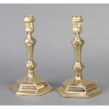 A pair of 17th style Century brass candlesticks of hexagonal form 20cm x 10cm (1 slightly bent)