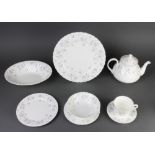 A Wedgwood April Flowers tea and dinner service comprising 8 tea cups, 8 saucers, 8 small plates,