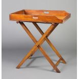 A Victorian rectangular mahogany butler's tray on folding stand 80cm h x 76cm w x 50cm d There is
