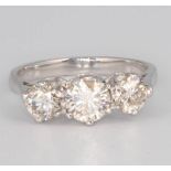 An 18ct white gold 3 stone diamond ring approx. 1.52ct, size K 1/2