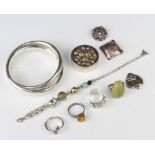A silver bangle and minor silver jewellery 133 grams