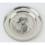 A silver commemorative salver for the Silver Wedding Anniversary Her Majesty Queen Elizabeth II