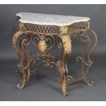 An Italian style wrought iron console table with white veined marble top, raised on cabriole