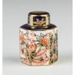 A Royal Crown Derby Imari pattern hexagonal tea caddy and cover 3.5cm