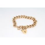 A 9ct yellow gold hollow link bracelet and padlock 20.5 grams