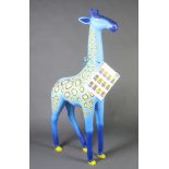 A papier mache figure of a giraffe, signed by the 2013/14 Chelsea FC Football team 161cm h x 70cm