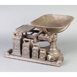 A set of costermongers iron scales complete with weights
