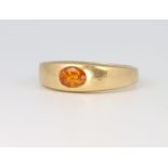 A gentleman's 18ct yellow gold citrine ring size W, 10.4 grams