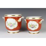 A Portuguese jardiniere, the orange ground decorated with a panel of spring flowers 16cm, a