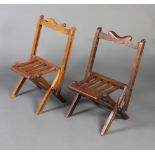 A pair of child's Edwardian mahogany slatted folding chairs 56cm h x 39cm w x 29cm d