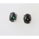 A pair of silver black Ethiopian ear studs