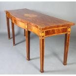 A Georgian Chippendale style inlaid and crossbanded mahogany serving table of serpentine outline