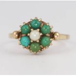 A 9ct yellow gold turquoise and seed pearl ring size M, 2.8 grams