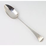 A William IV silver table spoon with bright cut decoration London 1834, 53 grams