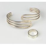 A silver free form bangle and a ditto ring