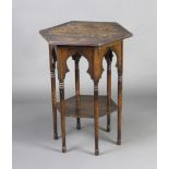 An Art Nouveau octagonal oak 2 tier occasional table raised on turned supports 68cm h x 55cm w x