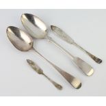 A Victorian silver table spoon, rubbed marks, 1 other and 2 butter knives