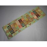 A turquoise, tan and pink ground wool Chobi Kilim runner 240cm x 75cm