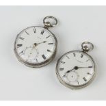 A Victorian silver key wind pocket watch with seconds at 6 o'clock, a small ditto