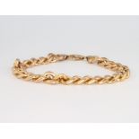 A 9ct yellow gold curb link bracelet 10.9 grams