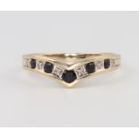 A 9ct yellow gold sapphire and diamond wishbone ring size T, 2.4 grams