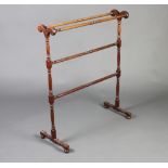 A Victorian turned mahogany towel rail 91cm h x 77cm w x 33cm d There is a small section of timber