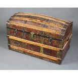 A Victorian leather and fibre bound domed trunk 61cm h x 91cm w x 51cm d, the interior is missing